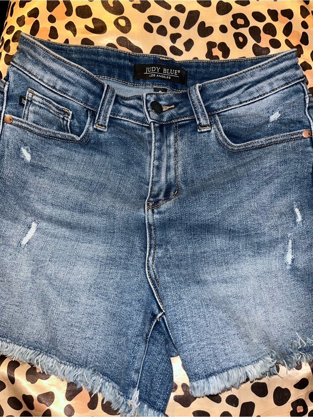 Judy Blue Medium Wash Distressed Denim Cutoff Shorts